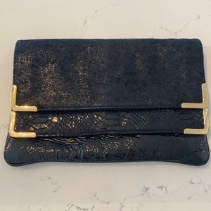 Michael Kors Black patent and gold clutch